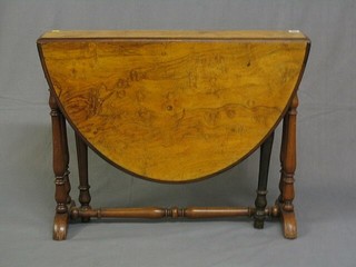 A Victorian figured walnutwood oval Sutherland table 32"
