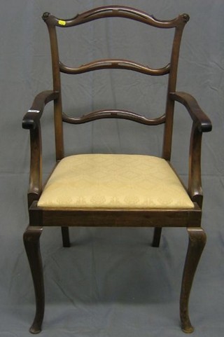 A 20th Century mahogany London ladderback carver chair with upholstered drop in seat, on cabriole supports