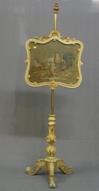 A 19th Century Continental gilt plaster pole screen, the banner with wool work decoration, decorated chickens