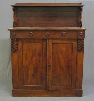 A Regency mahogany chiffonier with raised back, the base fitted 1 long drawer above a double cupboard, raised on a platform base 36"