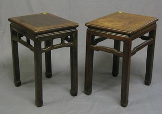 A pair of 19th Century Oriental Padouk stools 17"