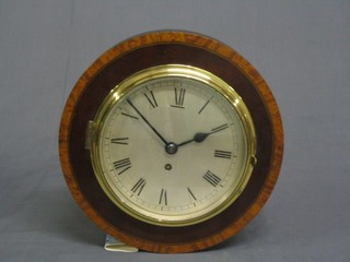 An Edwardian wall clock with 7" silvered dial and Roman numerals contained in an inlaid mahogany case