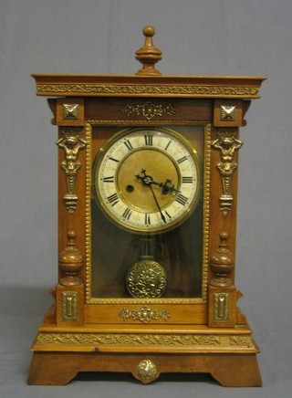 A 19th Century American 8 day striking shelf clock, the back plate marked TH contained in a pine case with gilt metal mounts