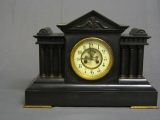 A 19th Century French 8 day striking mantel clock with porcelain dial, Arabic numerals and visible escapement, contained in a black marble architectural case