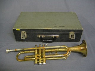 A brass B & M Champion trumpet, cased