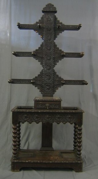 A Victorian carved oak hall stand
