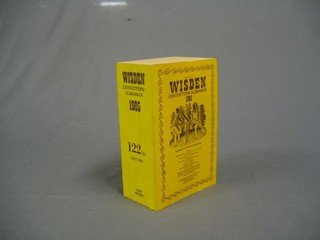 A 1985 edition of Wisden, paper bound