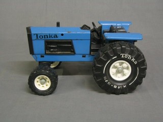 A Tonka model tractor