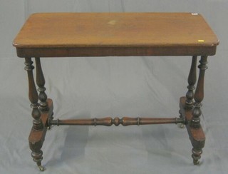 A Victorian mahogany stretcher table, raised on 4 turned columns united by an H framed stretcher 36"