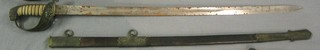 A Victorian Naval officer's sword with blade etched anchor and Royal Coat of Arms by Kenning Little Britain London, complete with scabbard