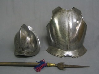 A well made 16th Century style breast plate with associated Morion helmet and partizan