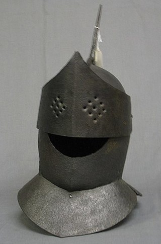 A 17th Century style blacksmiths  made Knight's helmet with visor and spike