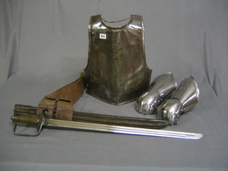 An English Civil War style polished steel breast plate, a pair of polished steel gauntlets and a 17th Century style sword and tender belt