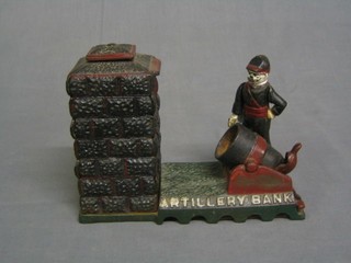 A reproduction cast iron artillery money box