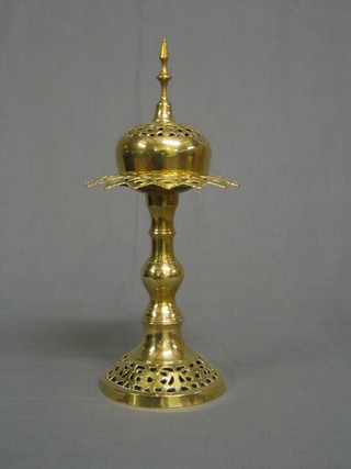 A circular 20th Century Oriental pierced brass incense burner 14"