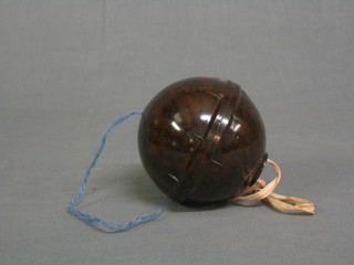 A brown Bakelite wool tidy, the base marked British NB797286 ware