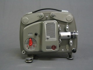 A Bell cine projector 18.5 with instructions together with a  Bell & Howell 466 24 projector