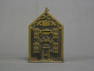 A 19th Century oil and brass money box in the form of a bank marked Richard Wilcox 1864 8" (some damage to the pinnacle) 