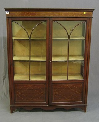An Edwardian inlaid mahogany display cabinet enclosed by astragal glazed panelled doors 42" (cut down)