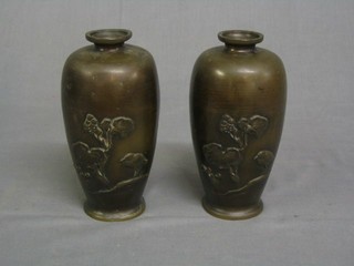A pair of 19th Century Japanese bronze vases decorated storks and flowers 7"