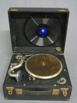 A portable gramophone in a fibre case