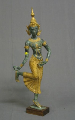 A Thai bronze figure of a standing lady on an oak base 30"