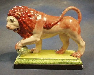 An 18th Century Staffordshire figure of The Medici lion, raised on a rectangular base (tooth missing, tail f and r) 9"