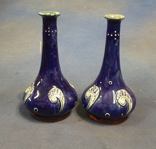 A pair of Royal Doulton club shaped vases with blue decoration, the bases marked Royal Doulton England 8317, 8" (1 with firing imperfection to base)