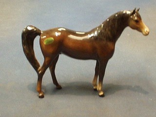 A Beswick standing figure of a bay horse 6"