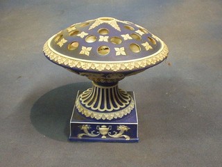 A Wedgwood circular blue Jasperware rose bowl raised on a circular base with square base, impressed Wedgwood V 1000 (spreader f and r) 8"