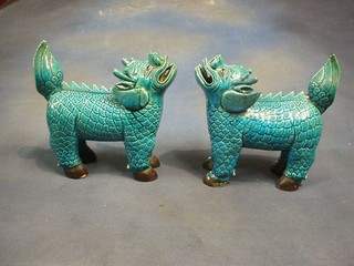 A pair of fine quality 18th/19th Century Oriental porcelain turquoise glazed standing Dogs of Fo, 8"