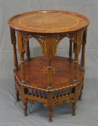An Eastern circular inlaid yew wood 2 tier occasional table 22"