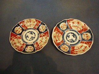 A pair of 19th Century Japanese Imari porcelain plates with panel and lobed decoration 8"