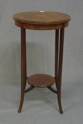 An Edwardian circular inlaid mahogany 2 tier occasional table on splayed feet 17"