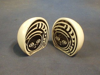 A 1960's white glazed salt and pepper set in the form of 2 spheres decorated cats