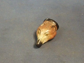A 19th Century Staffordshire pottery stirrup cup in the form of a foxes mask (f and r) 3"