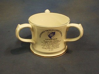 A Guiness 1983 limited edition Licence Victuallers School 3 handled tyg, the base marked Specially Produced for Guiness, limited edition of 1200