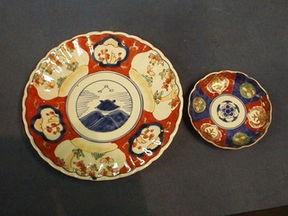 A 19th Century circular Japanese Imari porcelain plate 4 1/2", a larger plate  8 1/2"