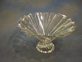 A circular fanned glass pedestal bowl 11"