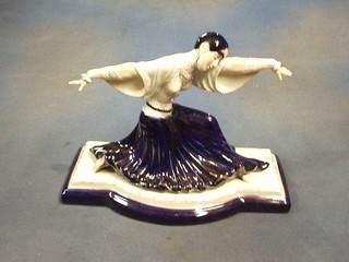 An Art Deco style blue and white pottery figure of a lady 12"