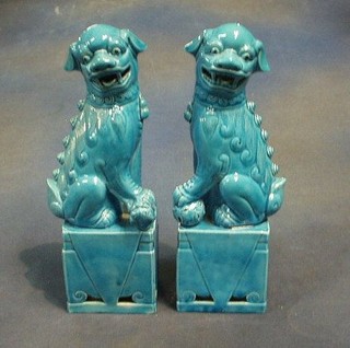 3 pairs of 20th Century graduated Oriental turquoise glazed Dogs of Fo
