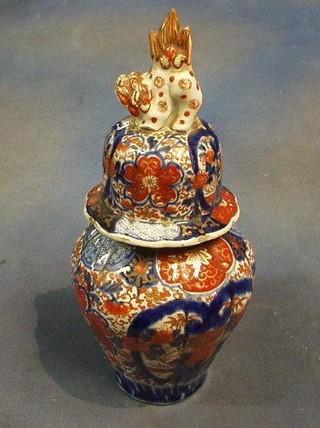 A 19th Century Japanese Imari porcelain urn and cover 14"