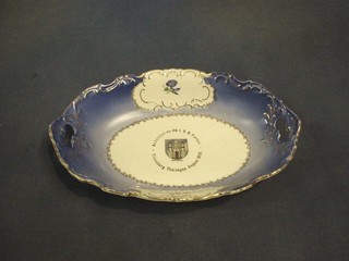 A German twin handled boat shaped porcelain bowl decorated the Arms of Eisenberg dated August 1939 12 1/2" (presented to the present owner by the Mayer Eisenberg)