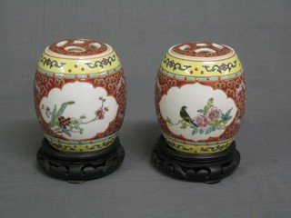 A pair of 20th Century Chinese famille vert porcelain ginger jars and covers decorated birds amidst branches 4", cased