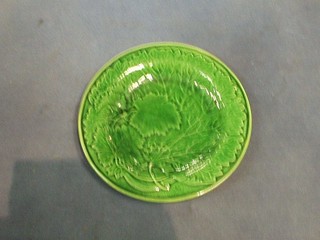 9 green leaf shaped plates (some damage)