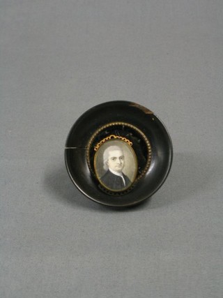 A portrait miniature on ivory "Head and Shoulders Portrait of a Gentleman" contained in a "gold" oval mount 1"