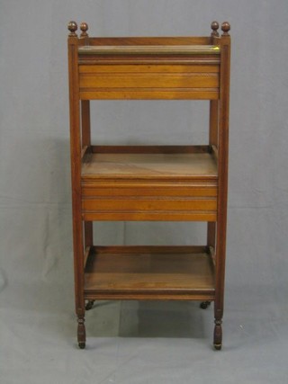 A Victorian walnutwood 3 tier what-not stand fitted 2 drawers 18"