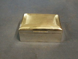 An Art Deco silver cigarette box with hinged lid and engine turned decoration (marks rubbed) 5"