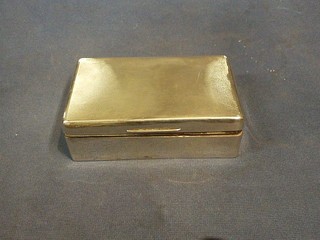 An Art Deco rectangular silver cigarette box with engine turned decoration and hinged lid, Birmingham 1936 5"