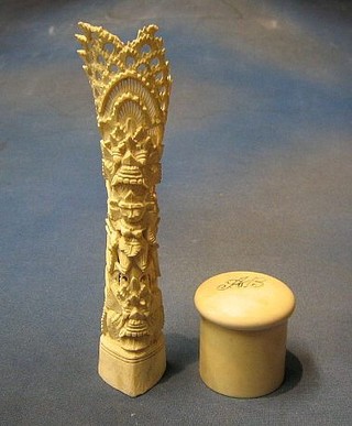A Victorian cylindrical ivory hair tidy 3" and section of carved ivory tusk decorated a Deity 9"